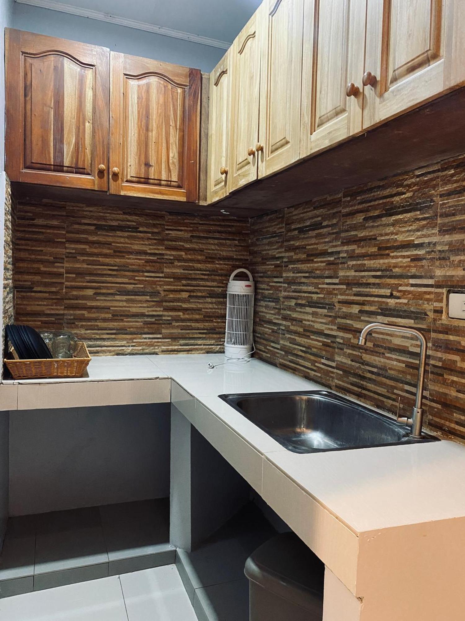 Lakayo Hillside Apartelle Сан-Хуан Экстерьер фото